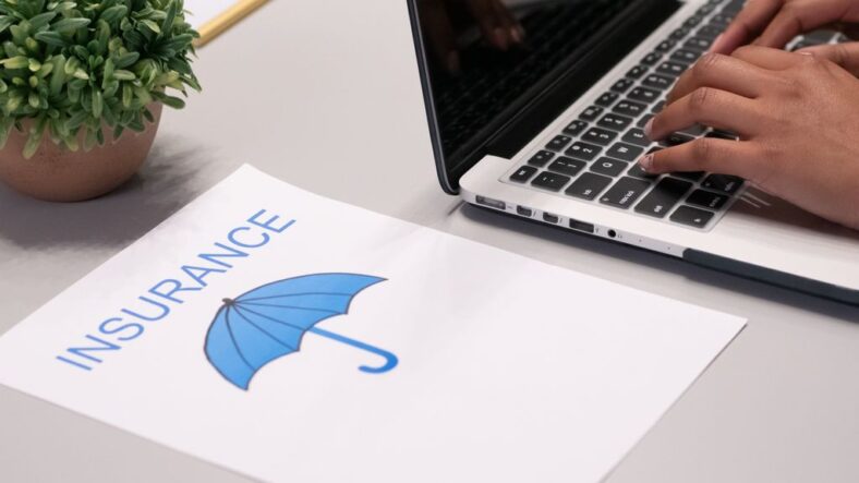 Business owner reviewing insurance documents in an office